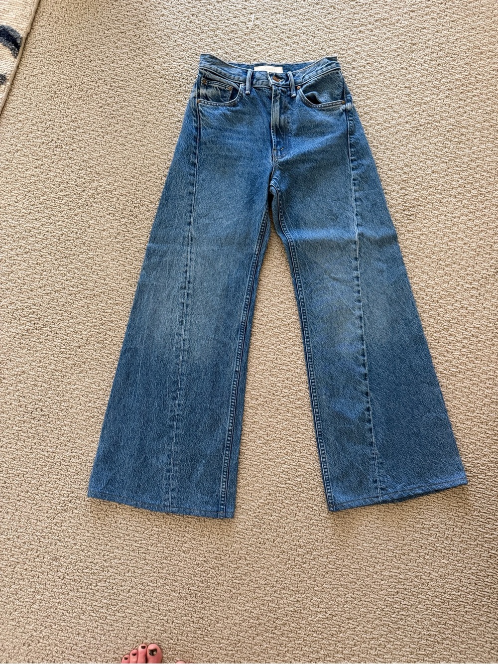 MOTHER Lemon Twist High-Rise Jeans in Medium Blue Denim